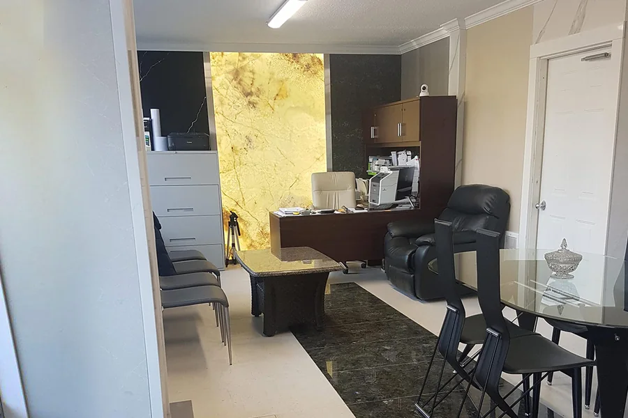 Illuminated stone feature in an office