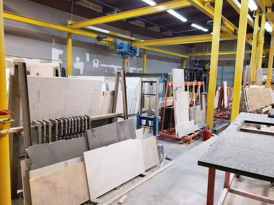 Stone slabs and equipment in Imperial’s Burnaby workshop